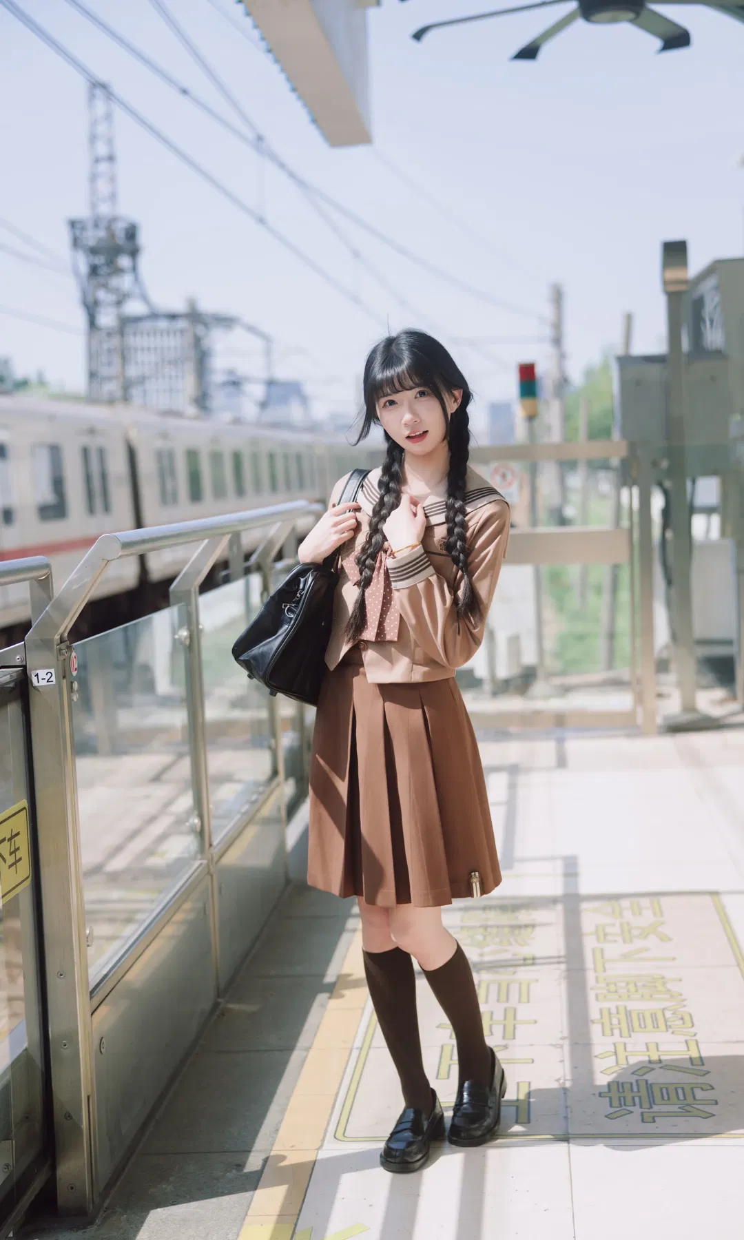 Autumn caramel brown-toned uniform photoshoot: Japanese style photography aesthetics on the station platform - Image 3