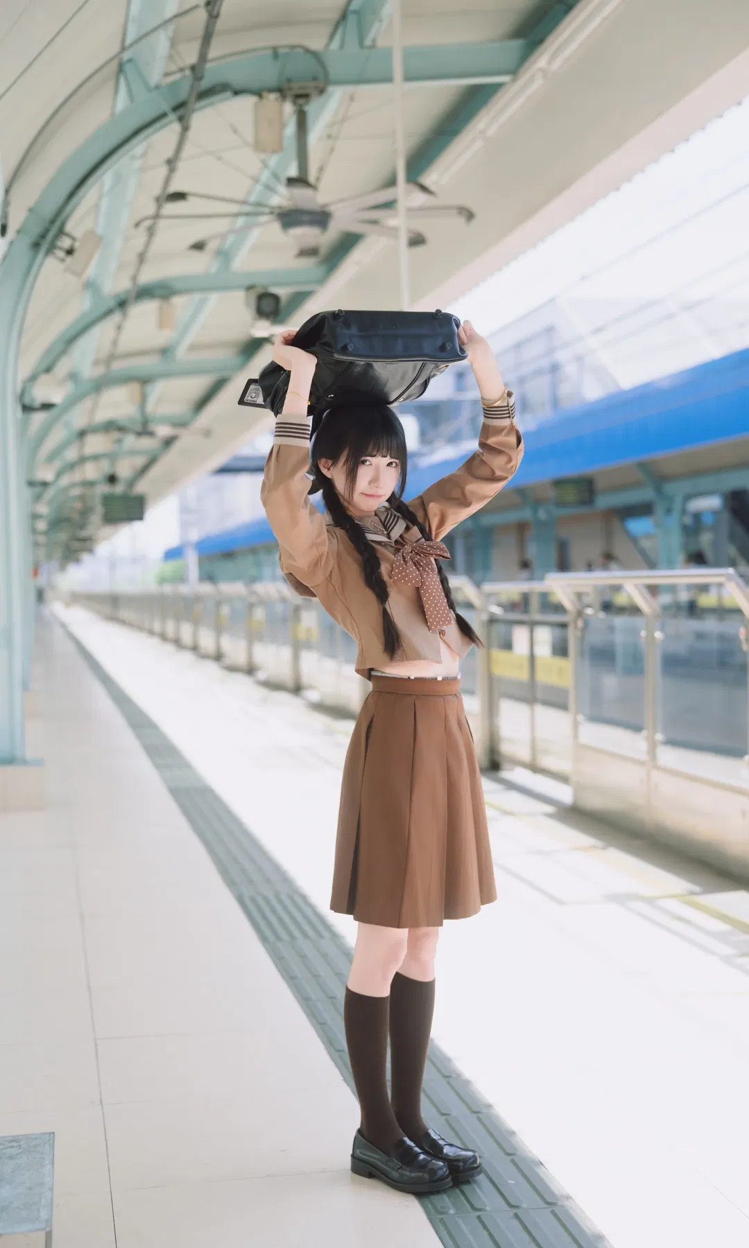 Autumn caramel brown-toned uniform photoshoot: Japanese style photography aesthetics on the station platform - Image 7