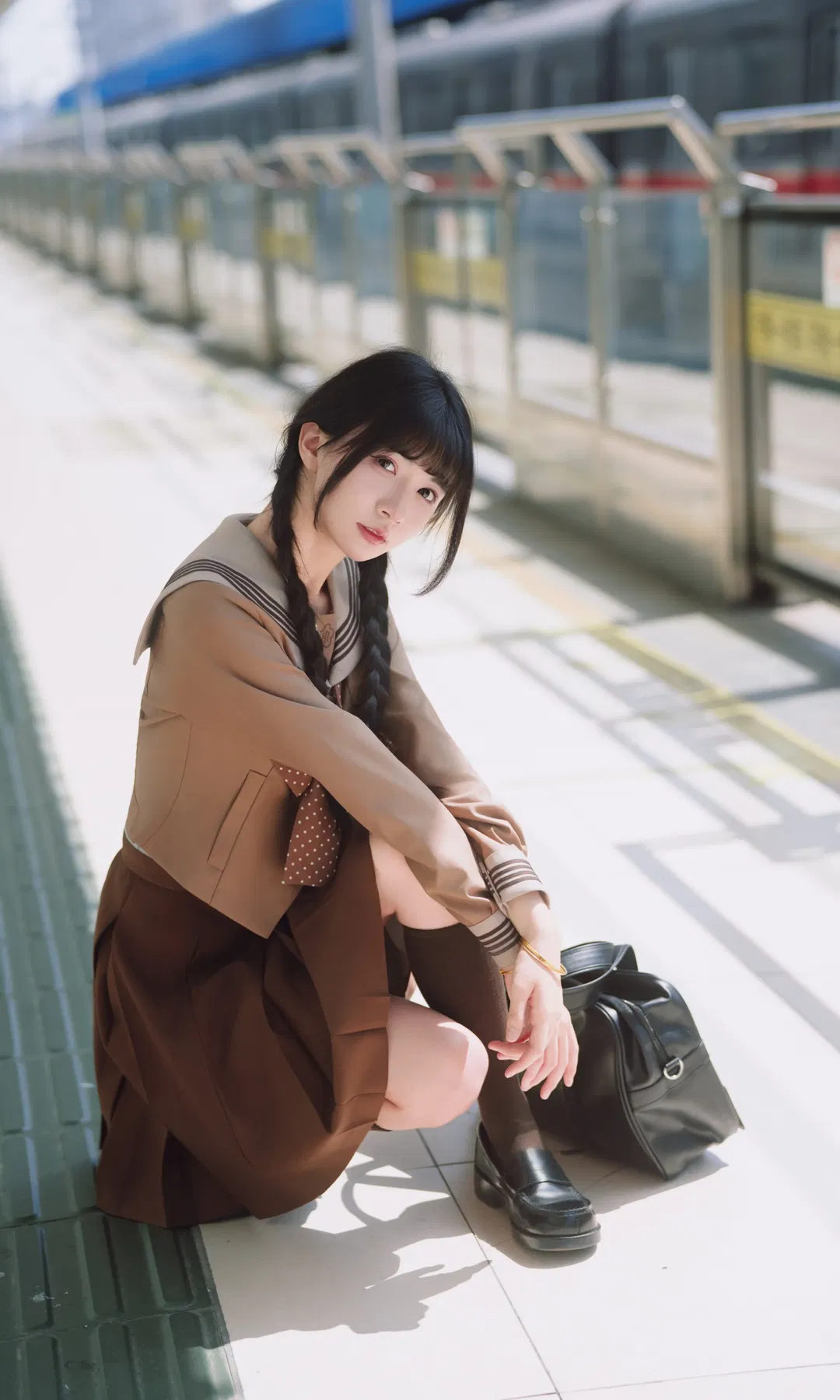 Autumn caramel brown-toned uniform photoshoot: Japanese style photography aesthetics on the station platform - Image 8