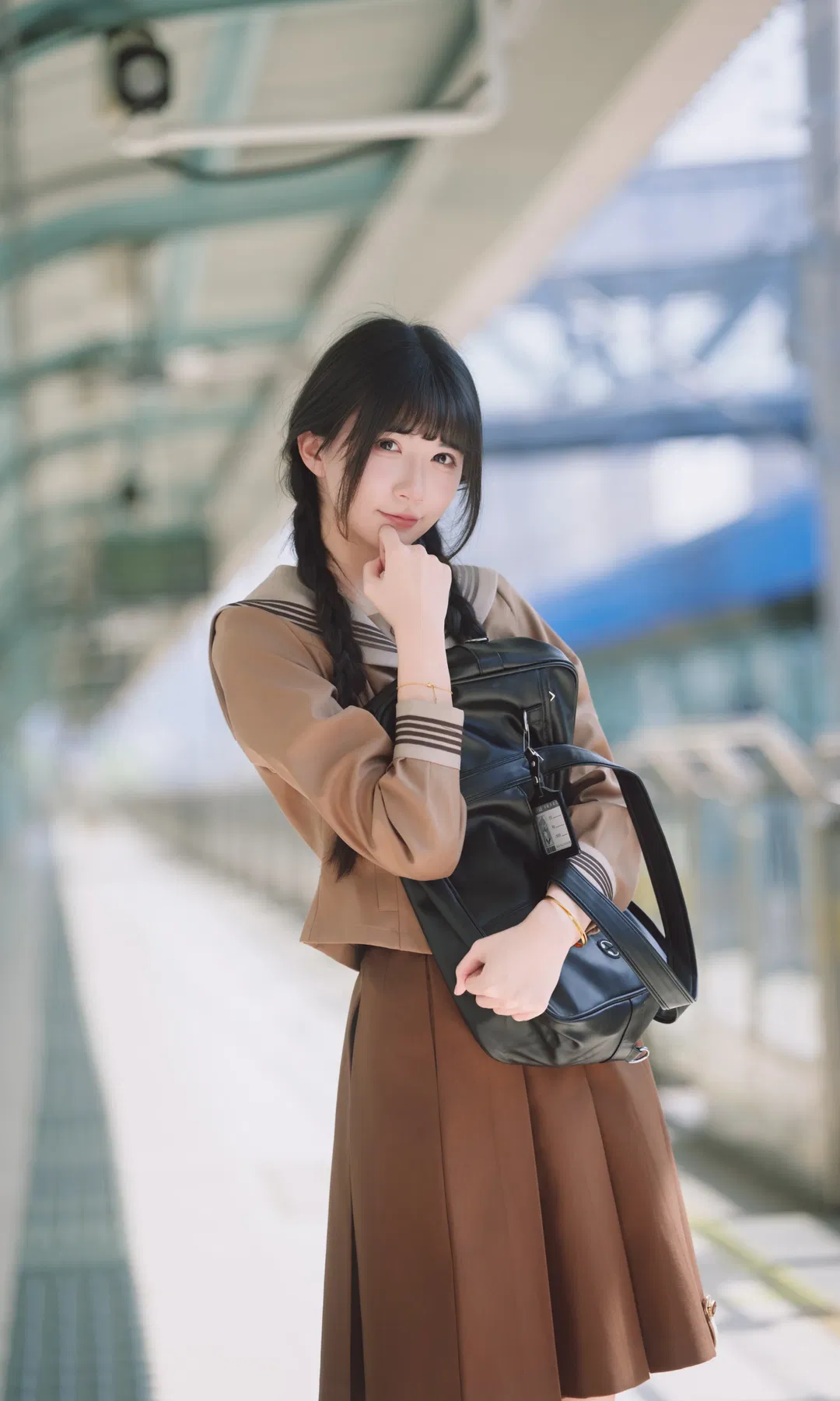 Autumn caramel brown-toned uniform photoshoot: Japanese style photography aesthetics on the station platform - Image 9